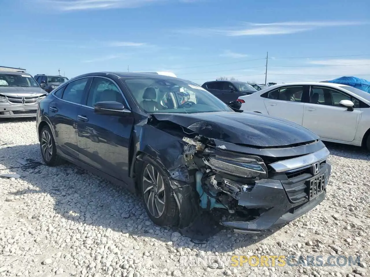 4 Photograph of a damaged car 19XZE4F93KE022378 HONDA INSIGHT 2019