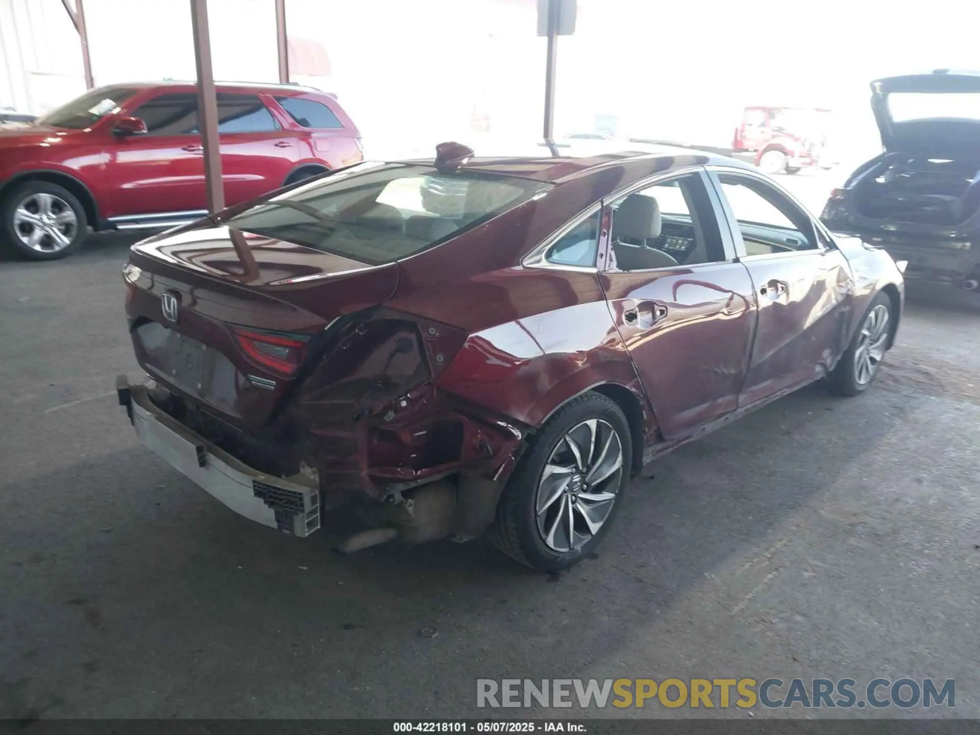 4 Photograph of a damaged car 19XZE4F94KE014483 HONDA INSIGHT 2019