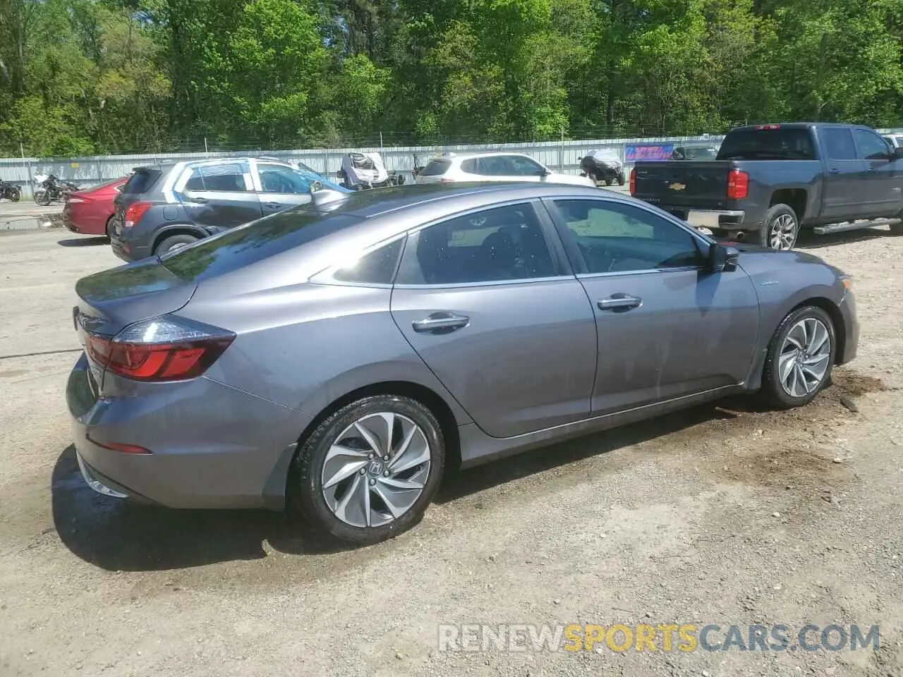 3 Photograph of a damaged car 19XZE4F94KE026861 HONDA INSIGHT 2019