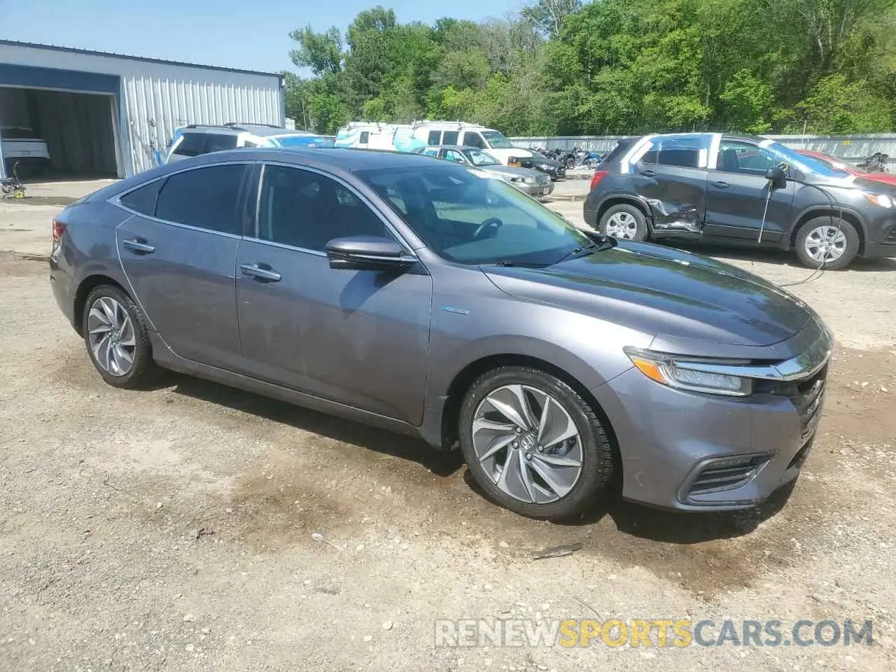 4 Photograph of a damaged car 19XZE4F94KE026861 HONDA INSIGHT 2019