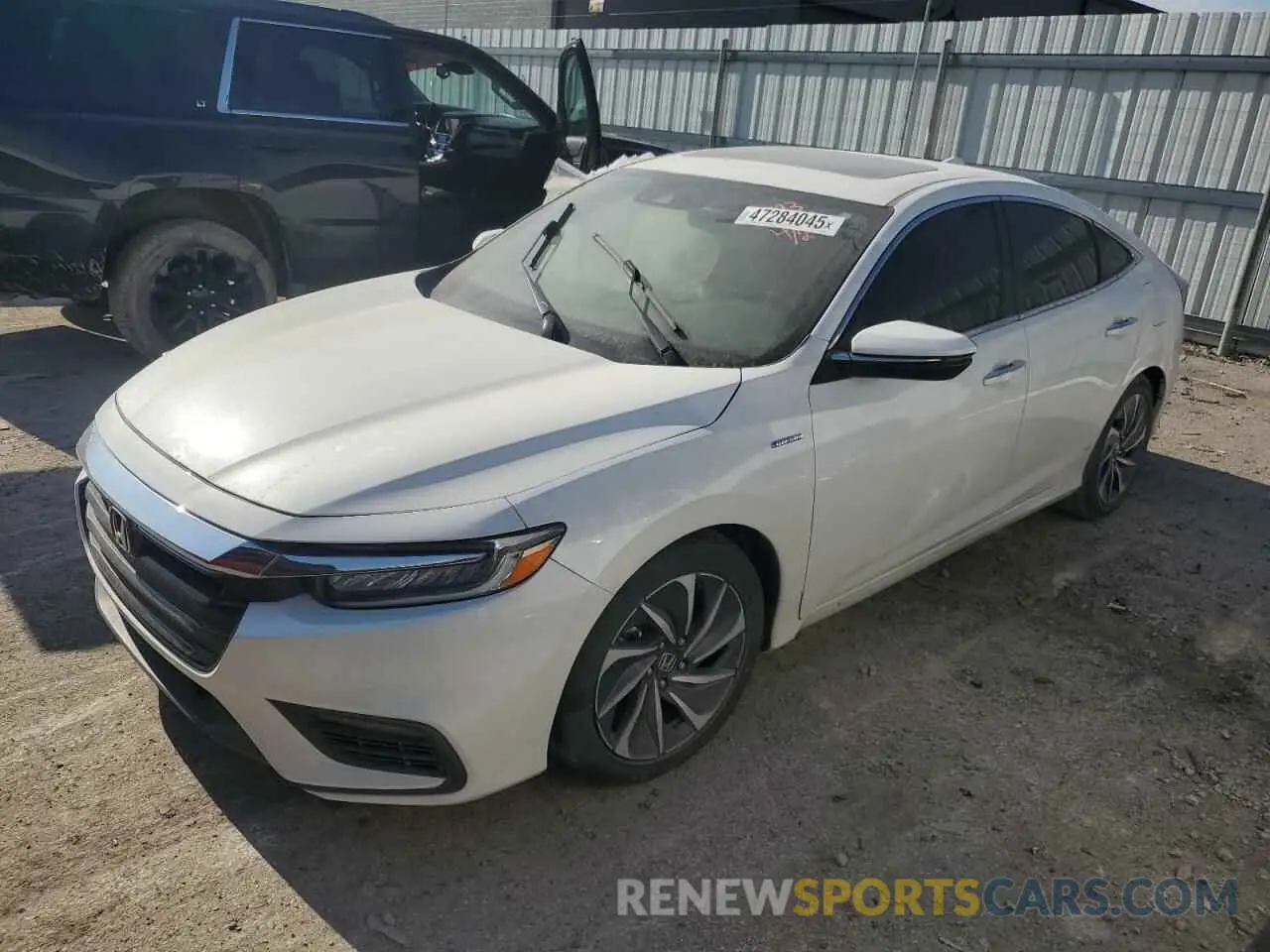 1 Photograph of a damaged car 19XZE4F96KE001993 HONDA INSIGHT 2019