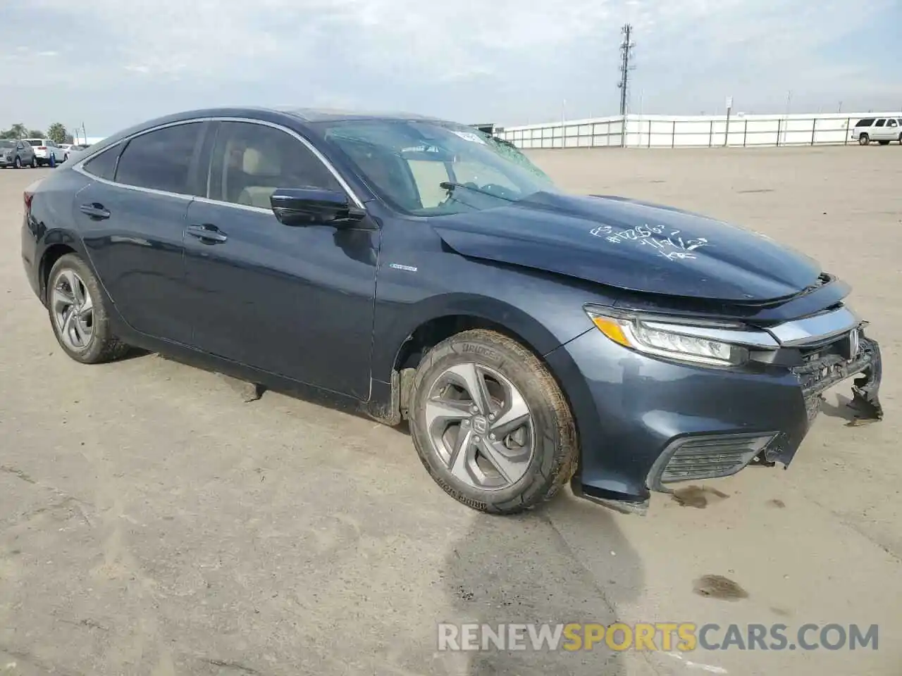 4 Photograph of a damaged car 19XZE4F50LE000627 HONDA INSIGHT 2020