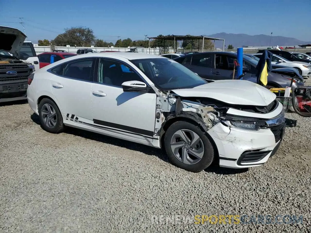 4 Photograph of a damaged car 19XZE4F50LE013278 HONDA INSIGHT 2020