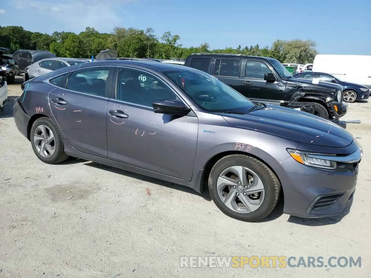 4 Photograph of a damaged car 19XZE4F51LE006856 HONDA INSIGHT 2020