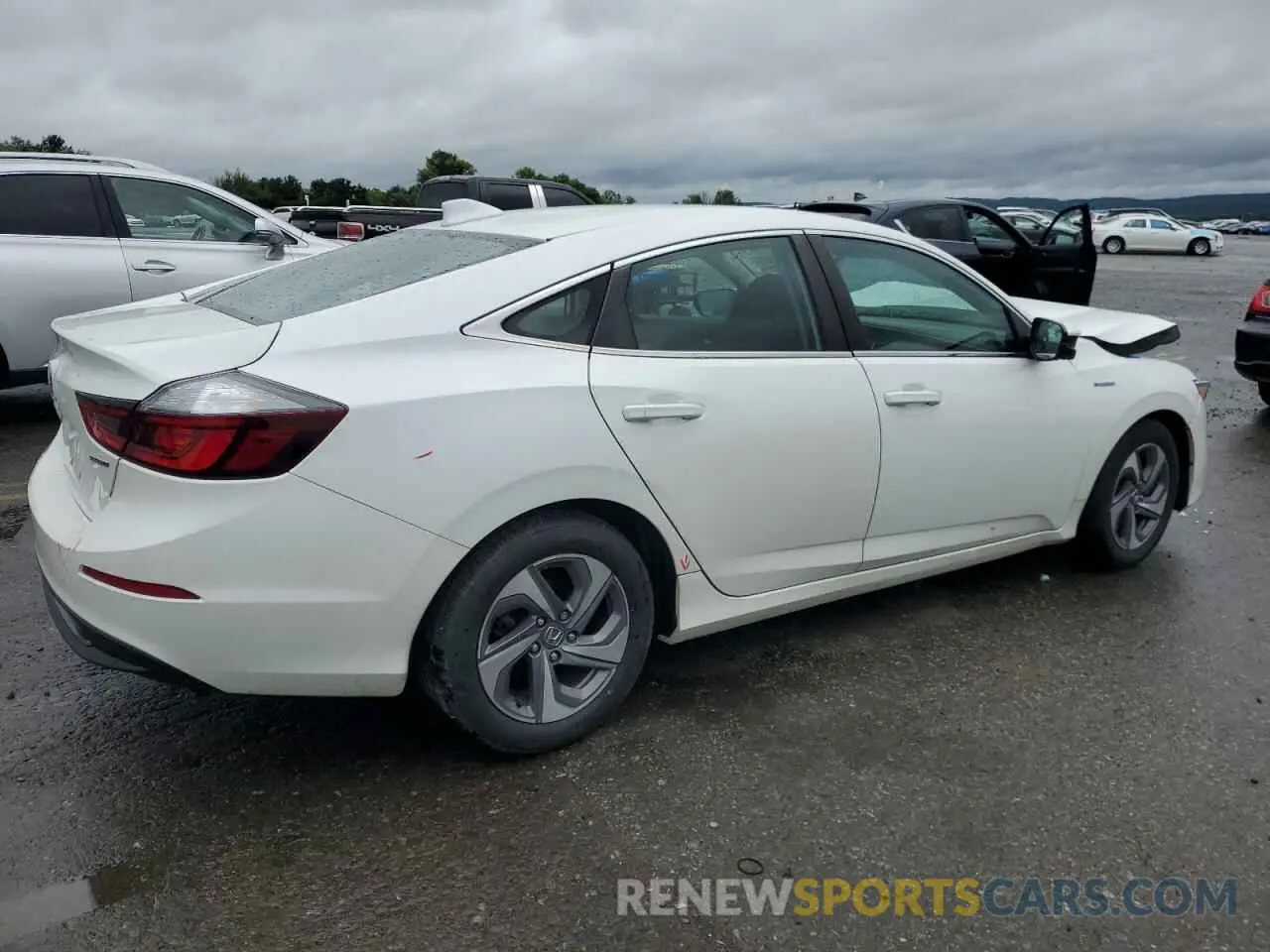 3 Photograph of a damaged car 19XZE4F53LE003859 HONDA INSIGHT 2020