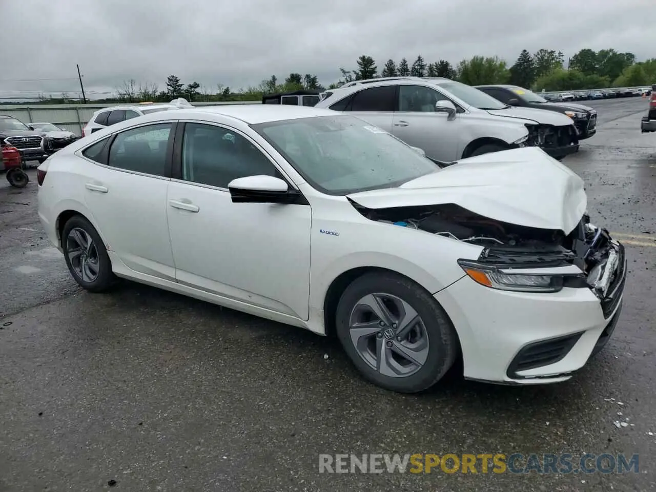4 Photograph of a damaged car 19XZE4F53LE003859 HONDA INSIGHT 2020