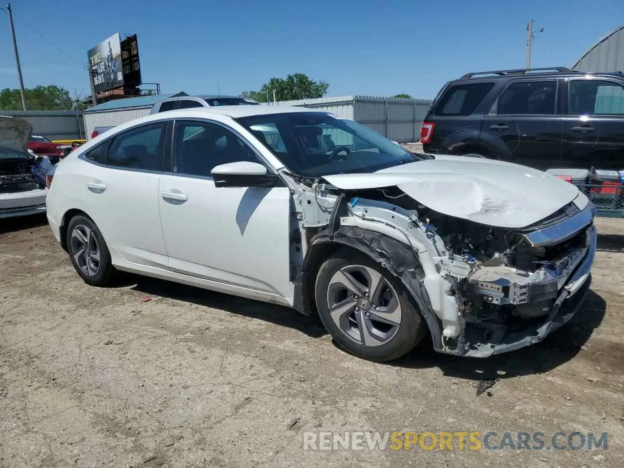 4 Photograph of a damaged car 19XZE4F53LE007961 HONDA INSIGHT 2020