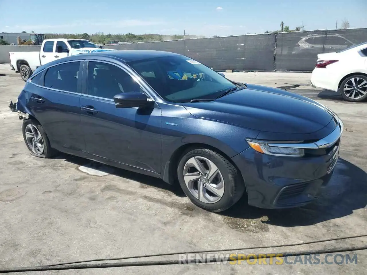 4 Photograph of a damaged car 19XZE4F56LE005959 HONDA INSIGHT 2020