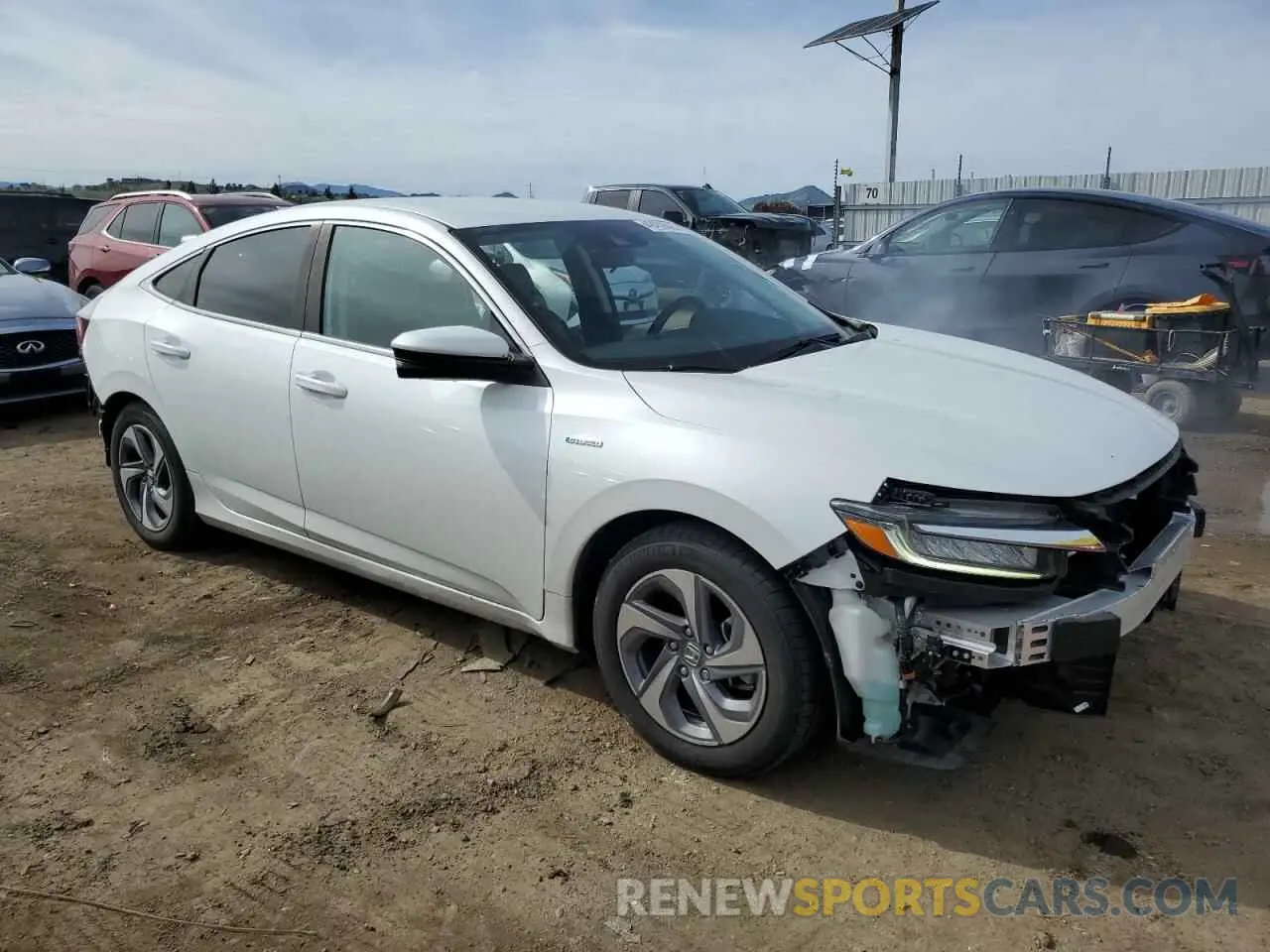 4 Photograph of a damaged car 19XZE4F56LE012510 HONDA INSIGHT 2020