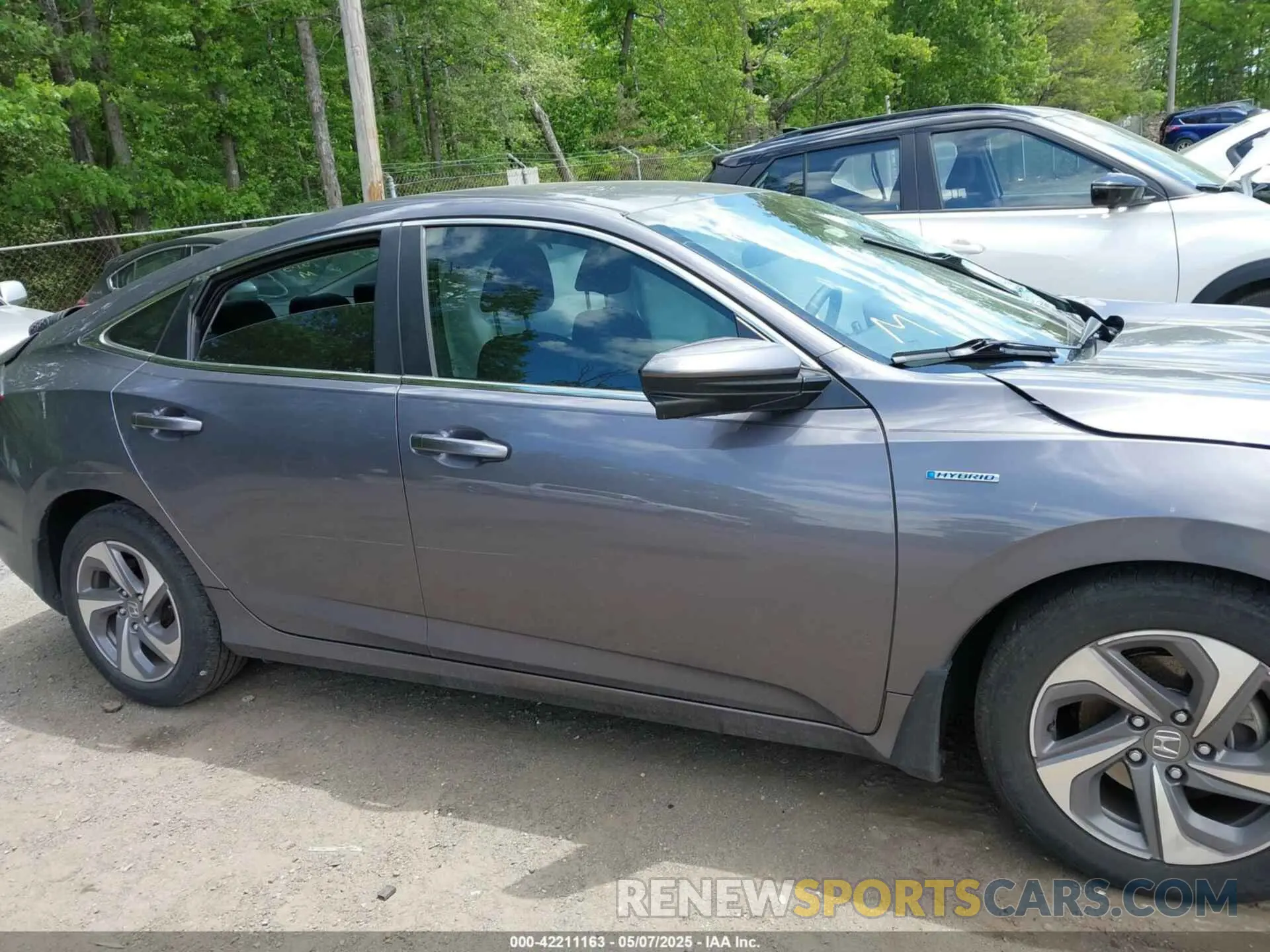 12 Photograph of a damaged car 19XZE4F57LE014721 HONDA INSIGHT 2020