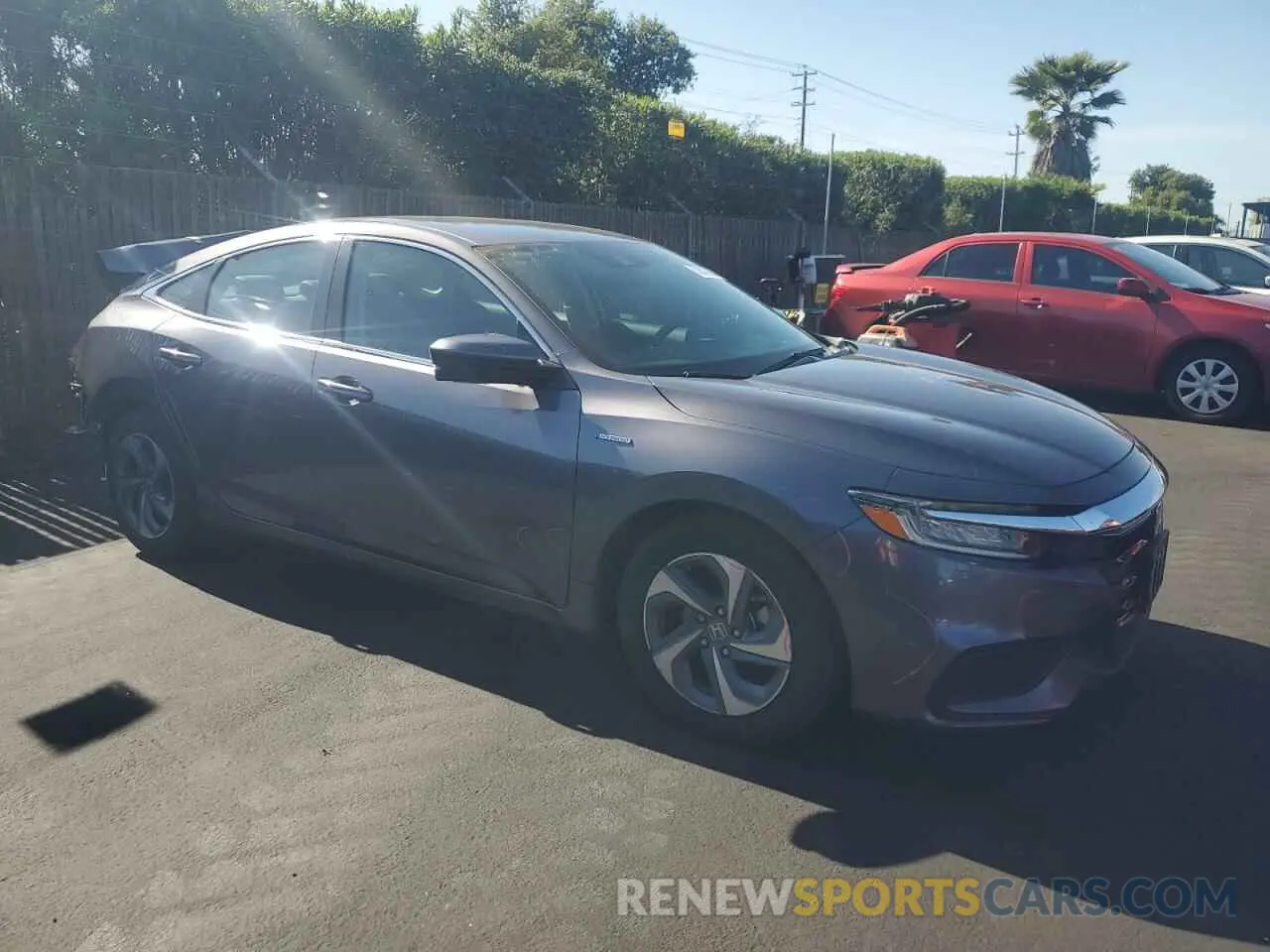 4 Photograph of a damaged car 19XZE4F58LE014761 HONDA INSIGHT 2020