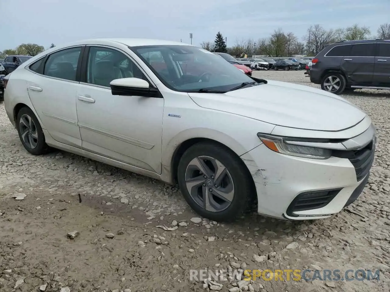 4 Photograph of a damaged car 19XZE4F59LE011321 HONDA INSIGHT 2020
