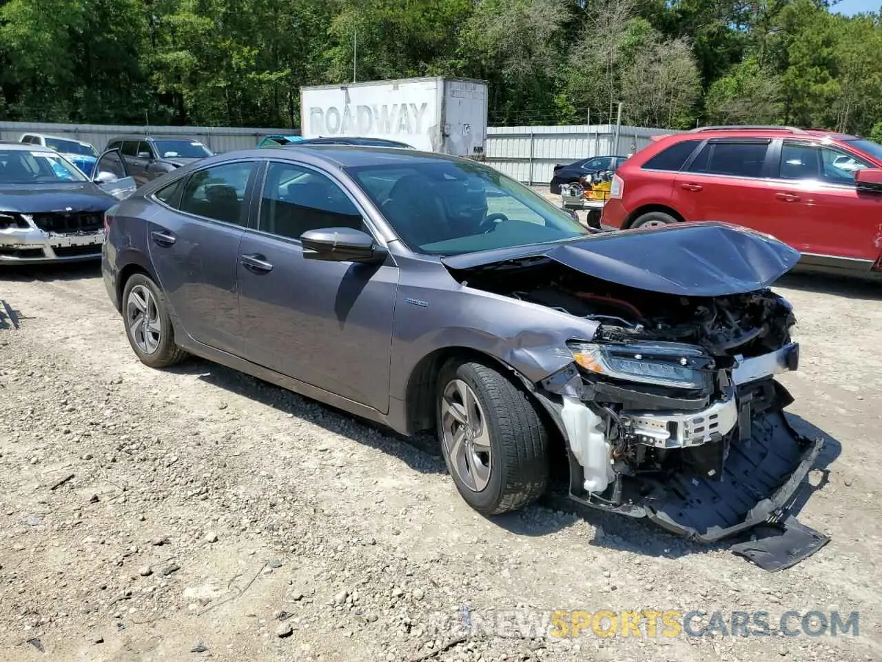 4 Photograph of a damaged car 19XZE4F59LE012095 HONDA INSIGHT 2020