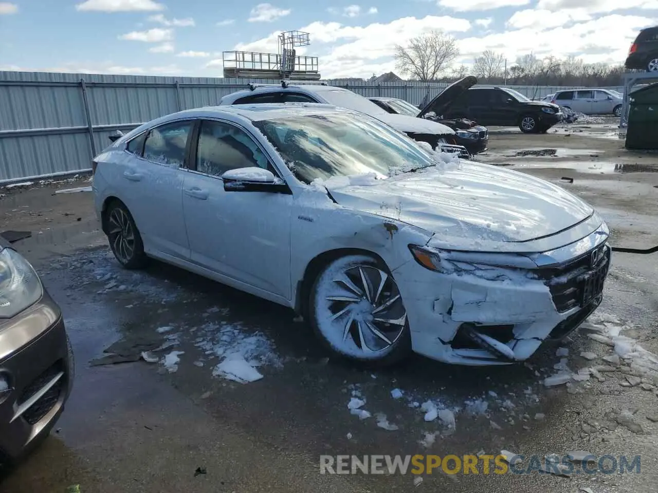 4 Photograph of a damaged car 19XZE4F93LE002908 HONDA INSIGHT 2020