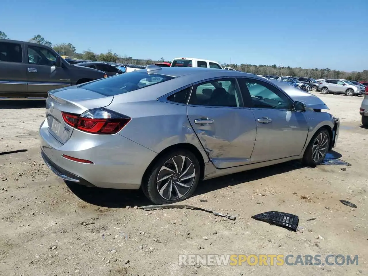 3 Photograph of a damaged car 19XZE4F93LE007106 HONDA INSIGHT 2020