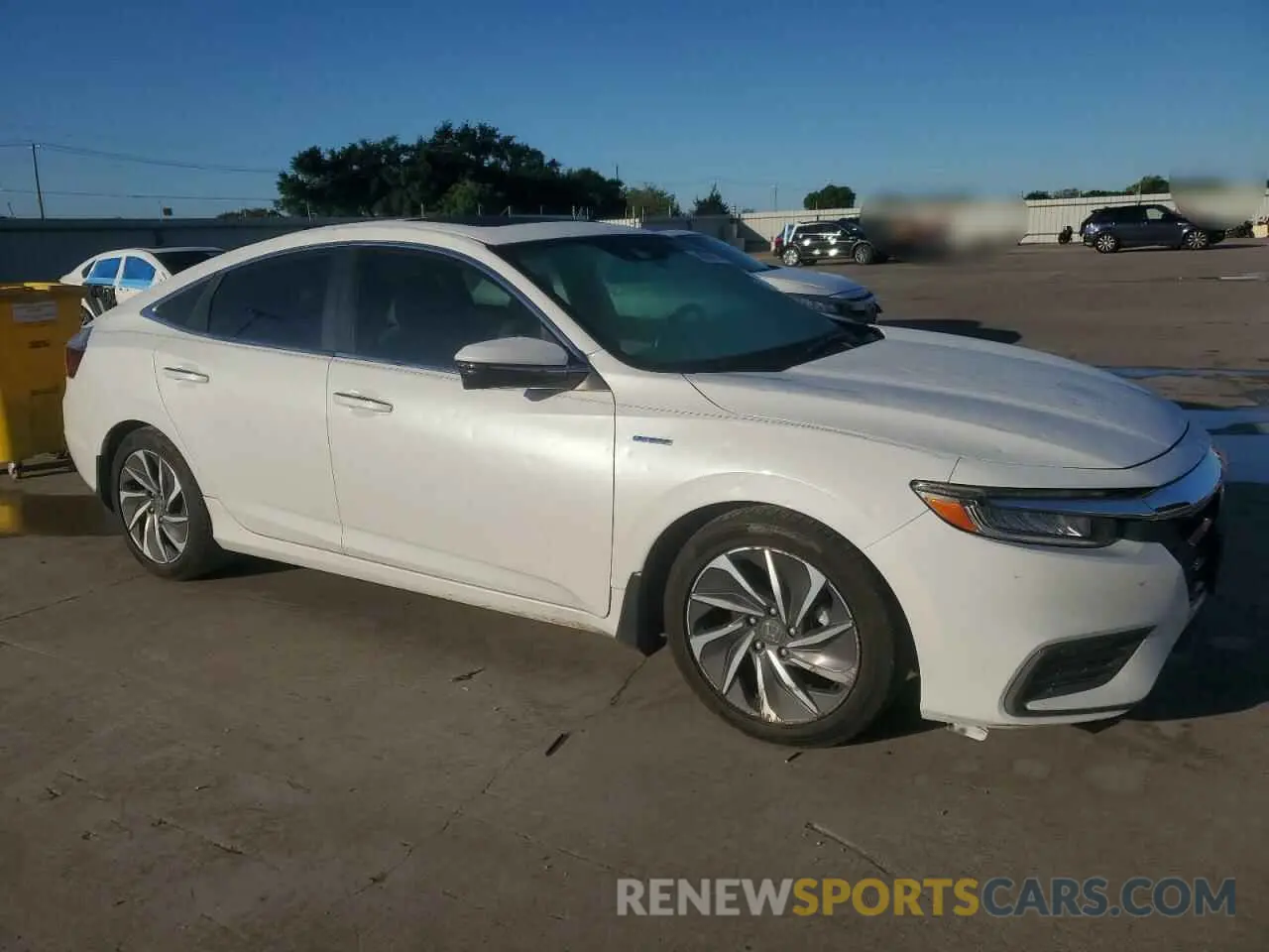 4 Photograph of a damaged car 19XZE4F93LE010264 HONDA INSIGHT 2020