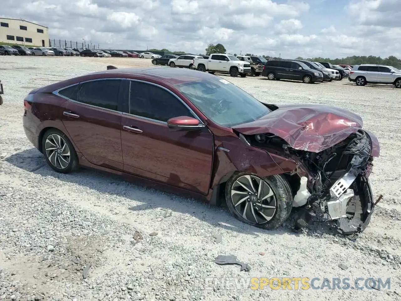 4 Photograph of a damaged car 19XZE4F94LE007065 HONDA INSIGHT 2020