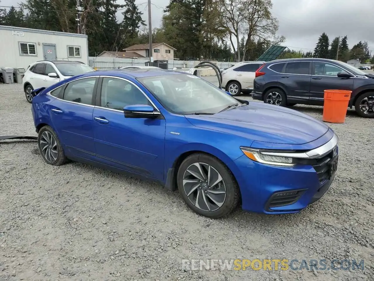 4 Photograph of a damaged car 19XZE4F97LE010980 HONDA INSIGHT 2020