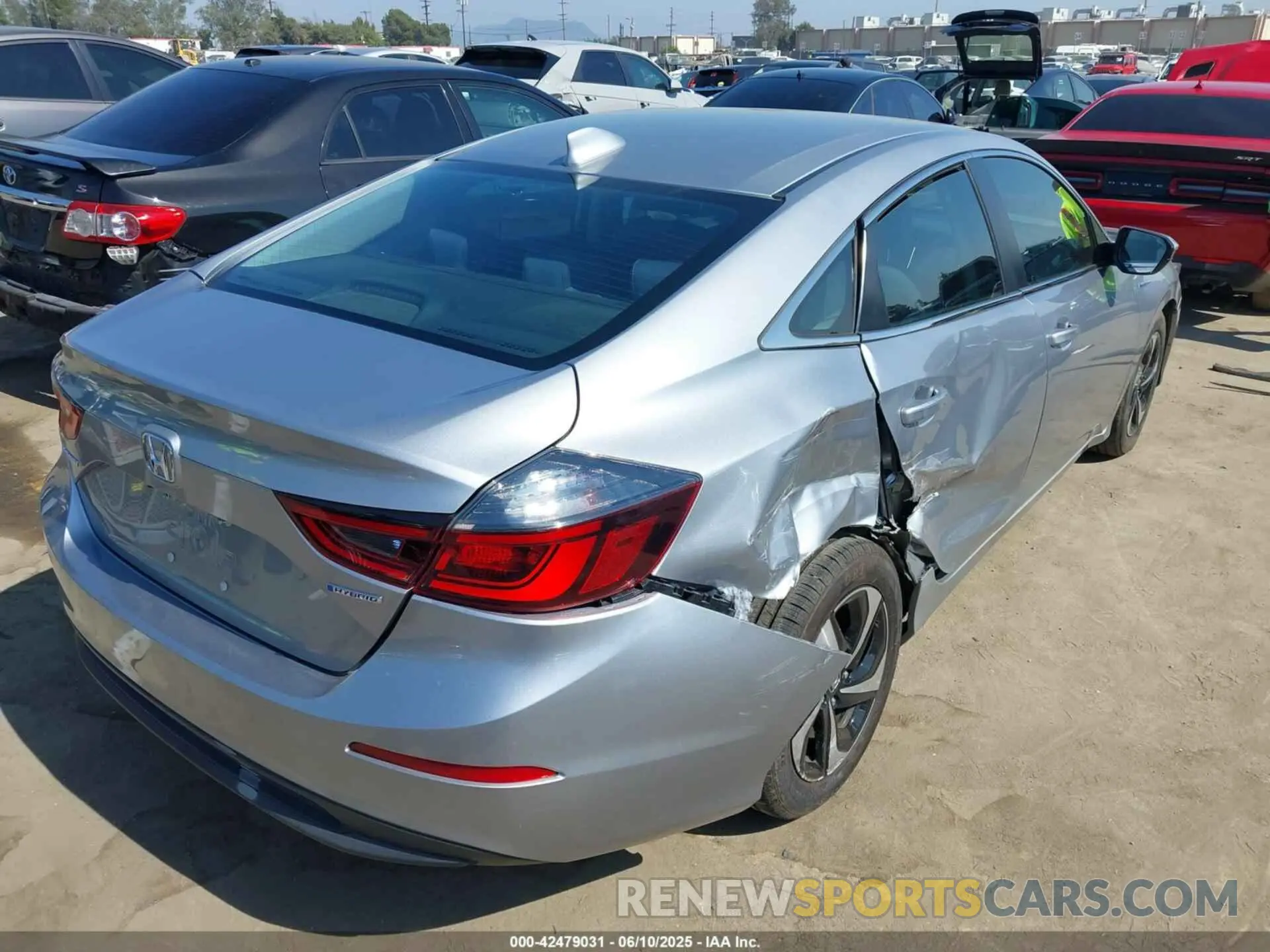 4 Photograph of a damaged car 19XZE4F50ME001374 HONDA INSIGHT 2021