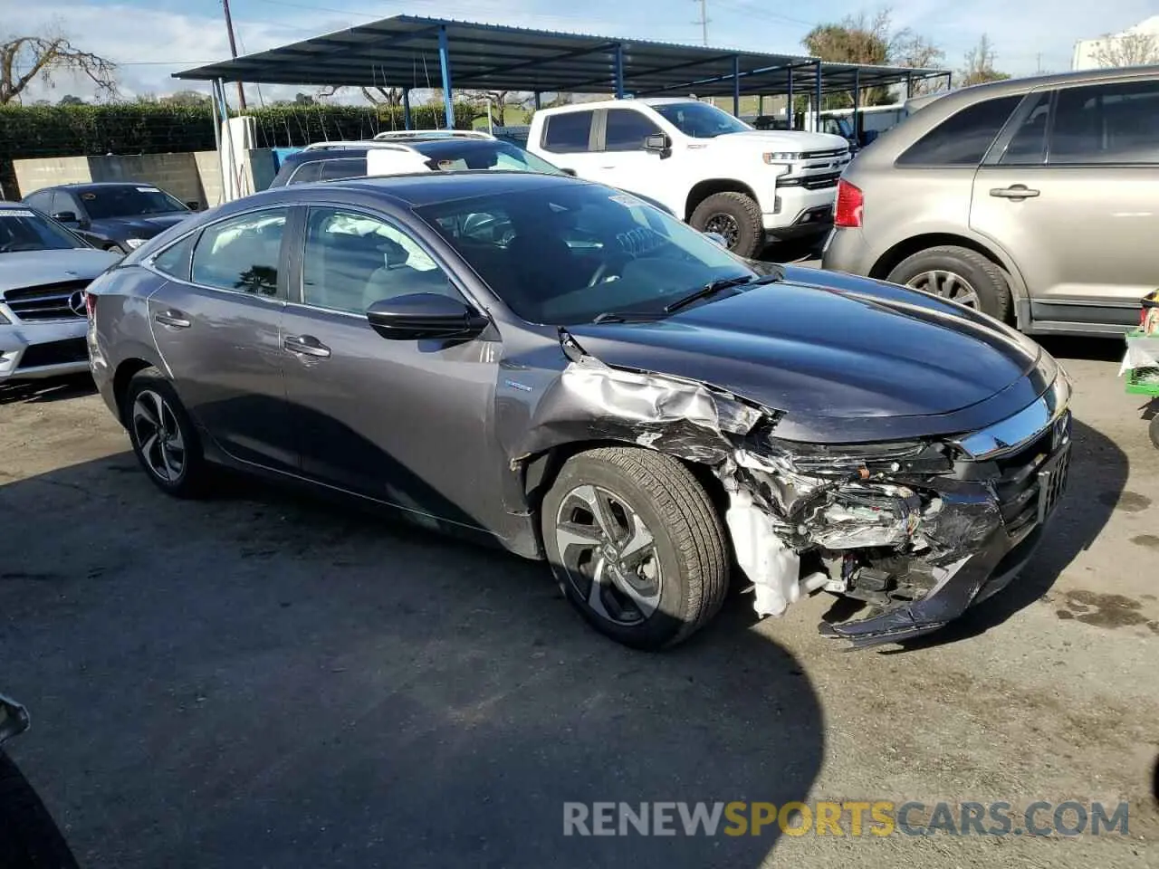 4 Photograph of a damaged car 19XZE4F50ME011306 HONDA INSIGHT 2021