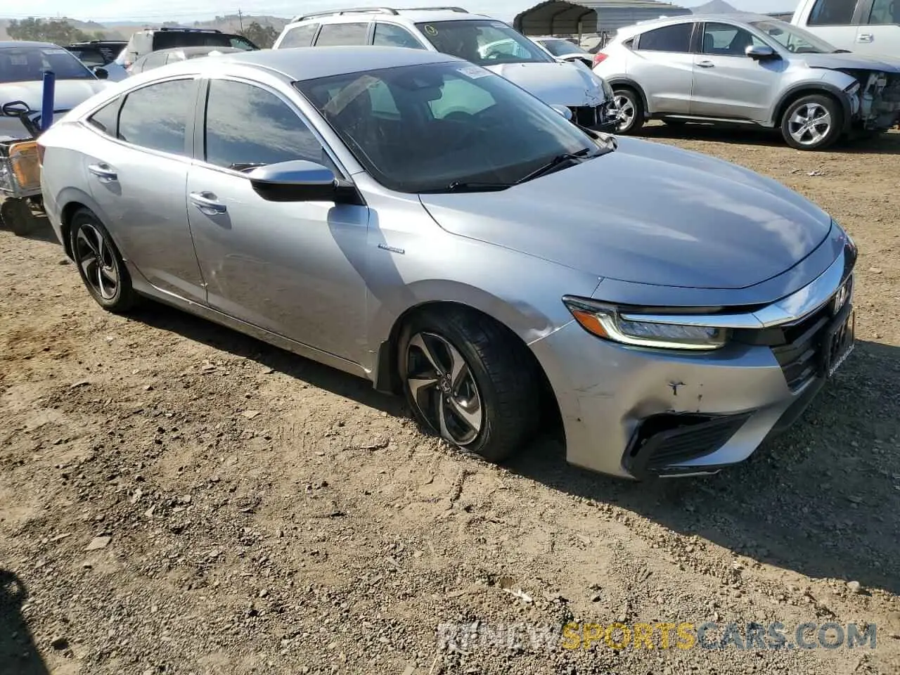 4 Photograph of a damaged car 19XZE4F51ME009290 HONDA INSIGHT 2021