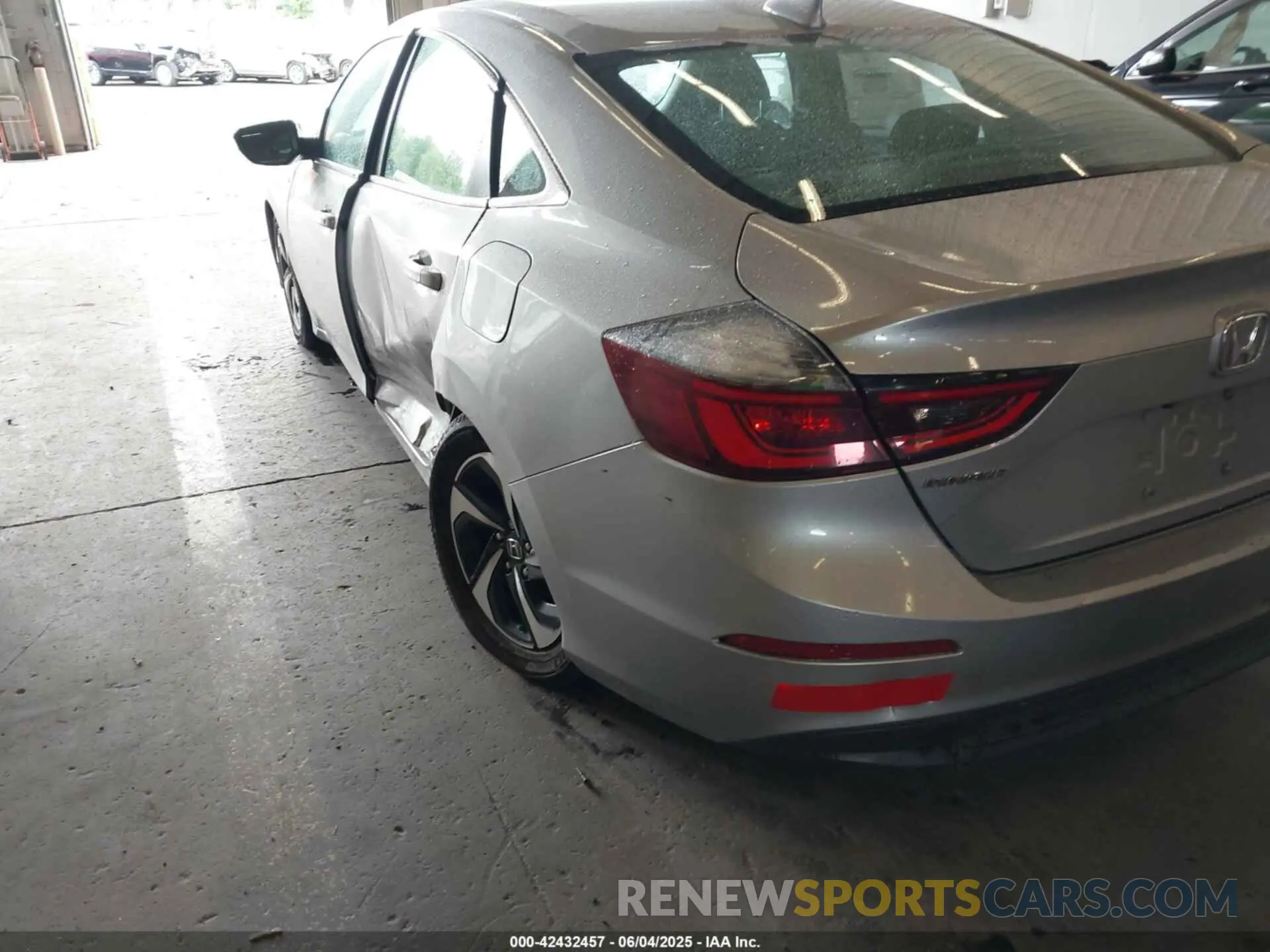19 Photograph of a damaged car 19XZE4F54ME002043 HONDA INSIGHT 2021