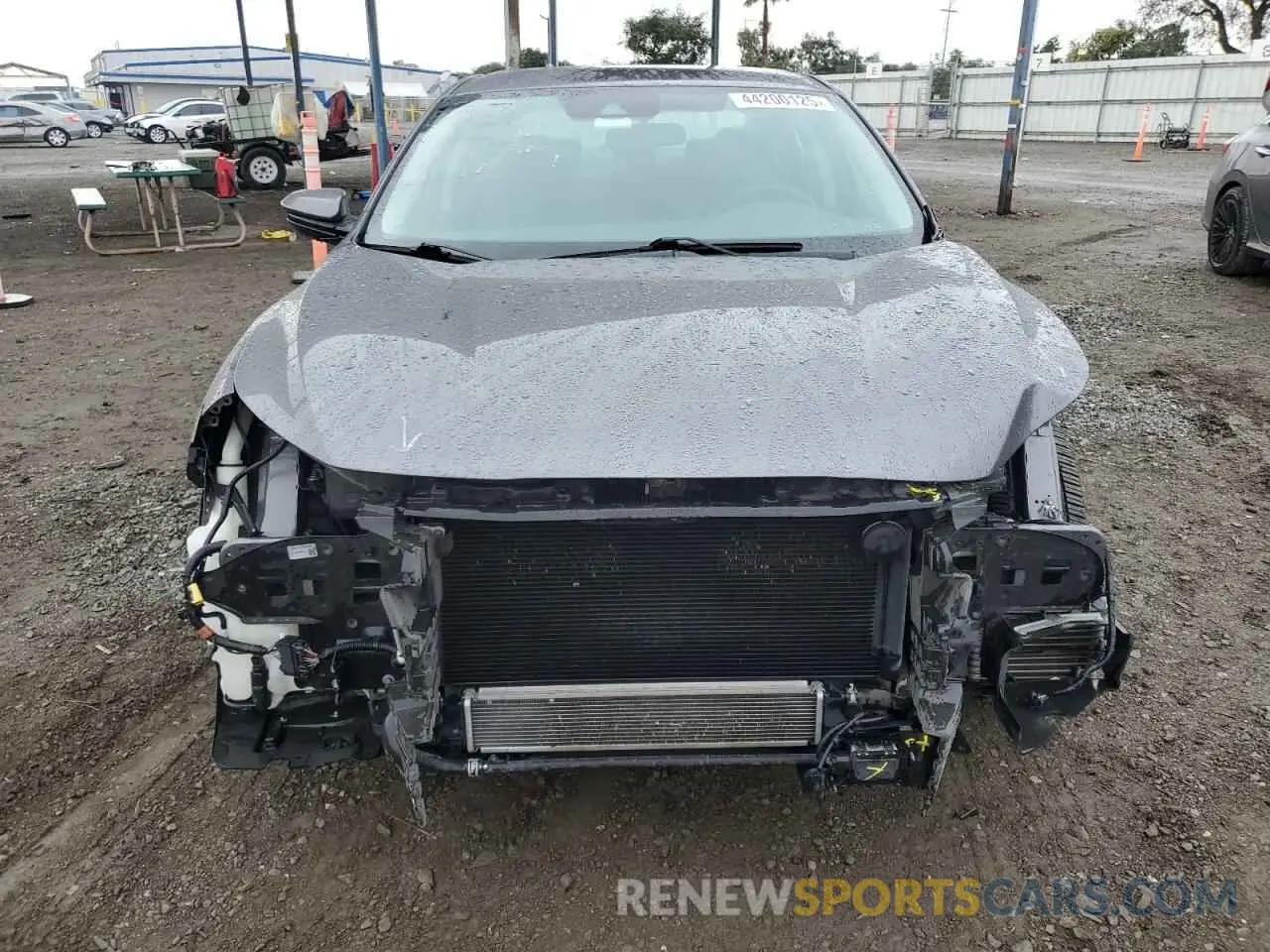 5 Photograph of a damaged car 19XZE4F54ME011504 HONDA INSIGHT 2021