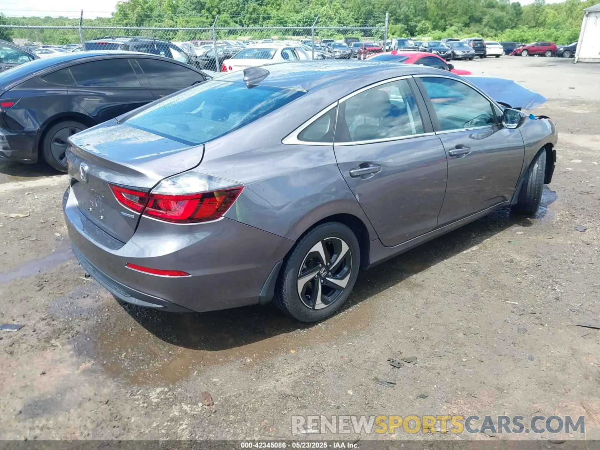 4 Photograph of a damaged car 19XZE4F55ME005131 HONDA INSIGHT 2021