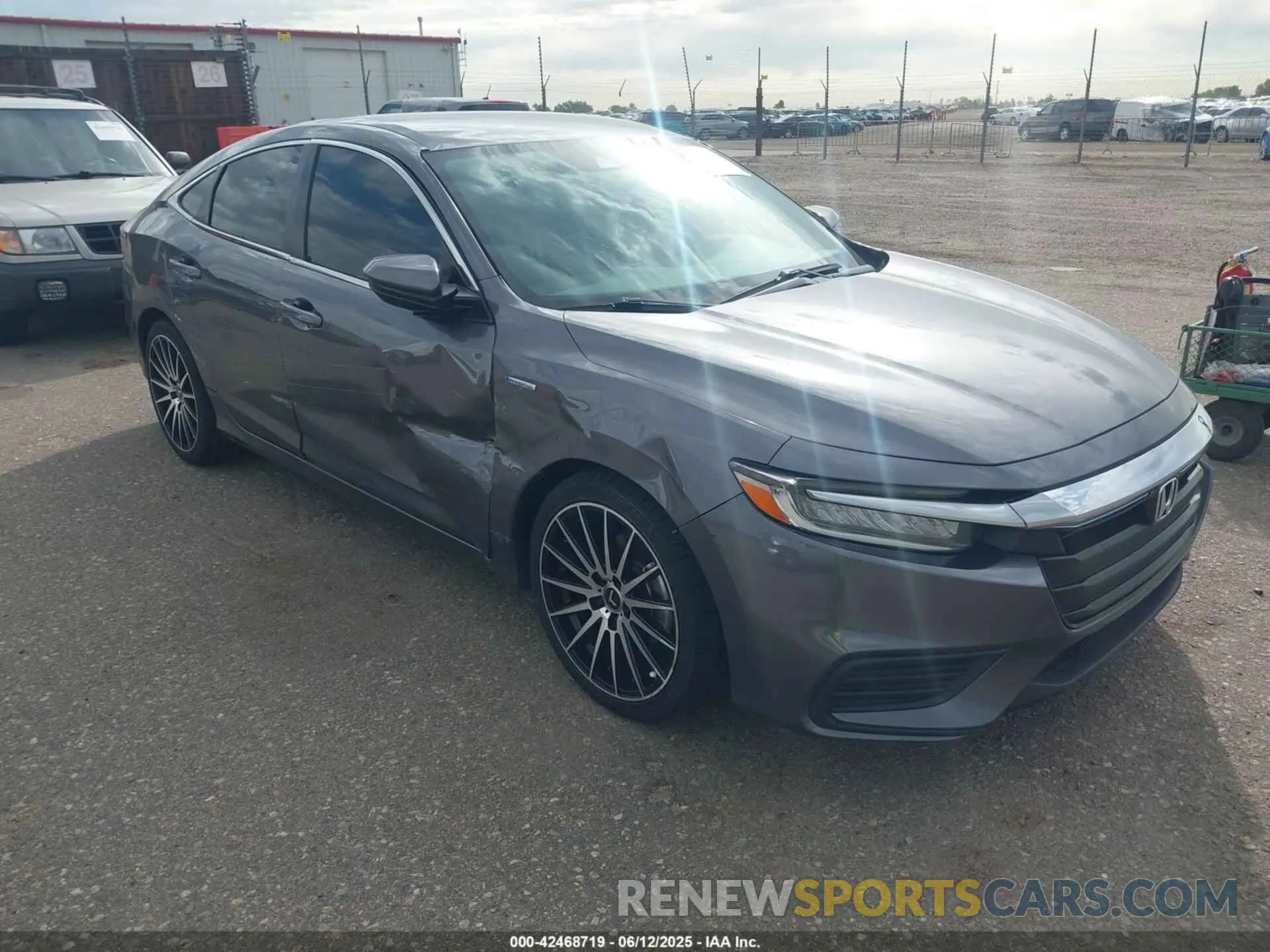 1 Photograph of a damaged car 19XZE4F55ME011124 HONDA INSIGHT 2021