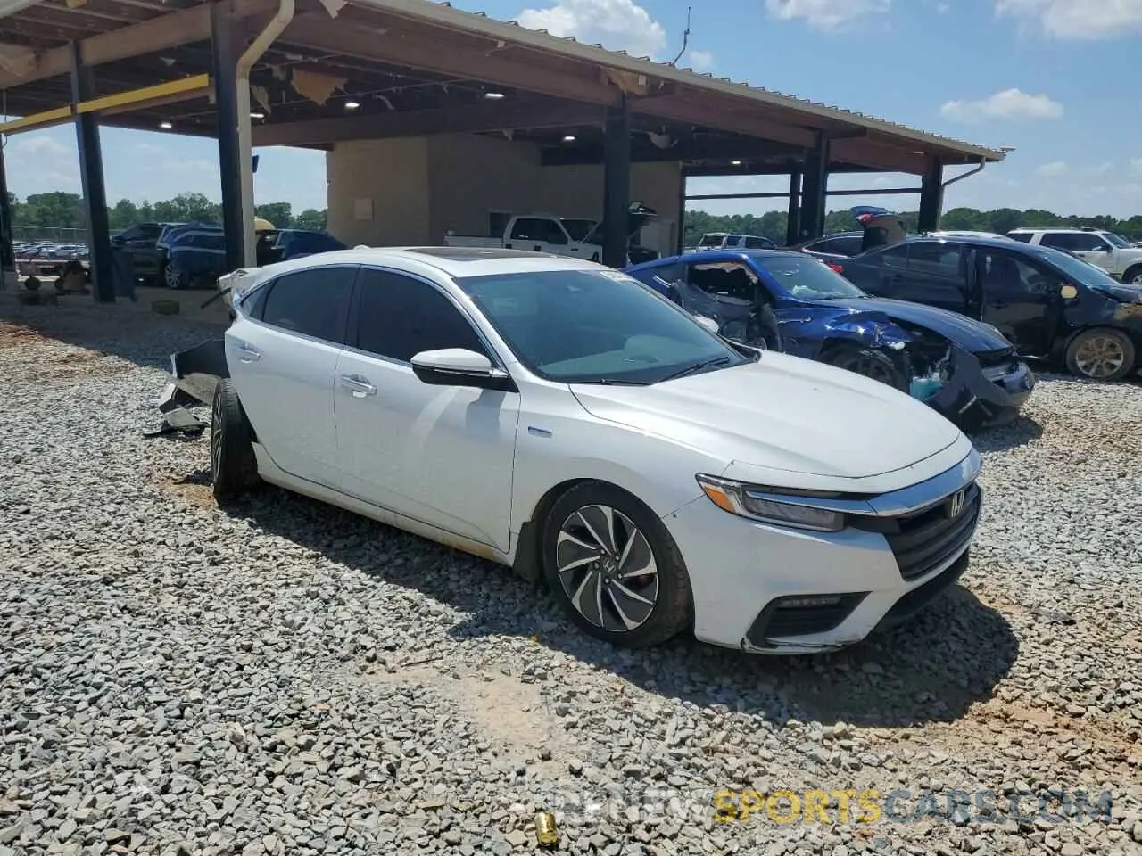 4 Photograph of a damaged car 19XZE4F91ME008336 HONDA INSIGHT 2021