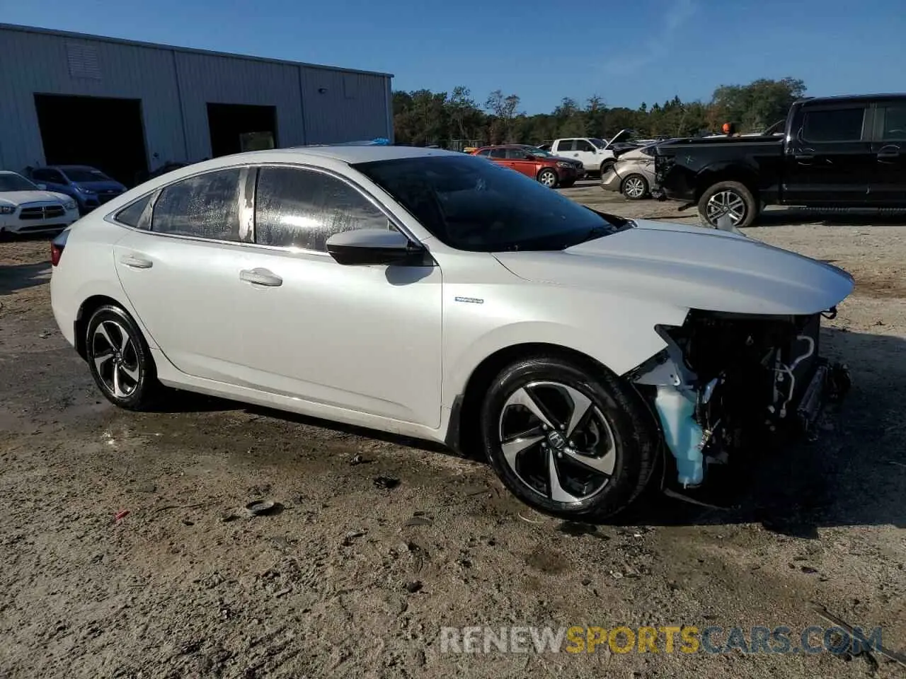 4 Photograph of a damaged car 19XZE4F50NE003532 HONDA INSIGHT 2022