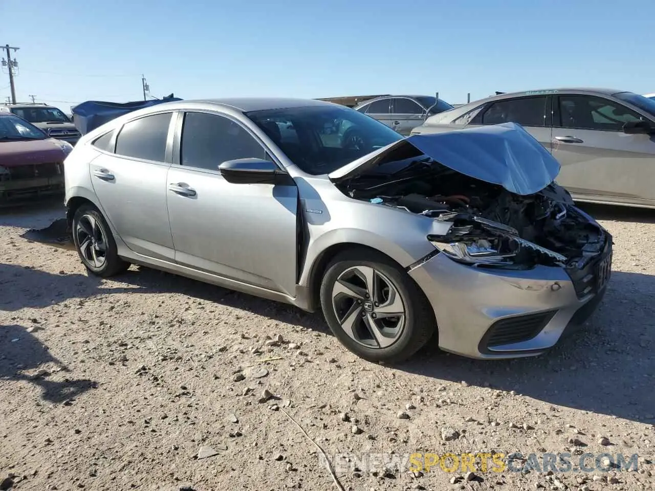 4 Photograph of a damaged car 19XZE4F50NE008083 HONDA INSIGHT 2022