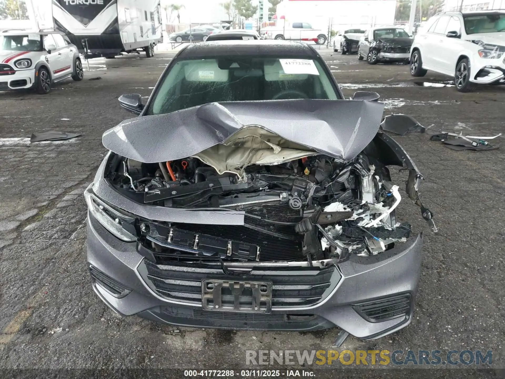 12 Photograph of a damaged car 19XZE4F52NE009235 HONDA INSIGHT 2022