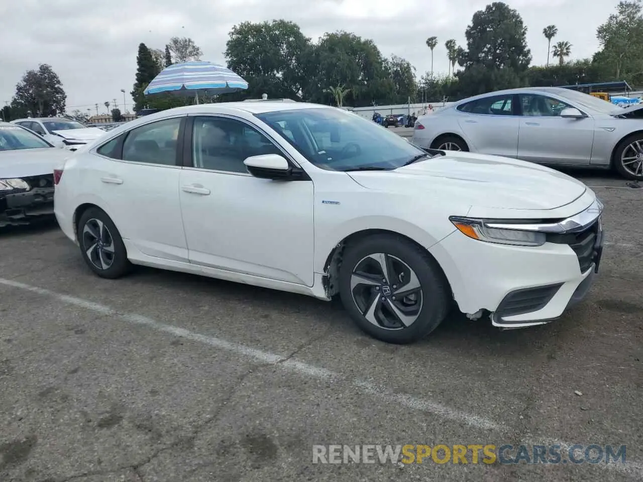 4 Photograph of a damaged car 19XZE4F52NE014032 HONDA INSIGHT 2022