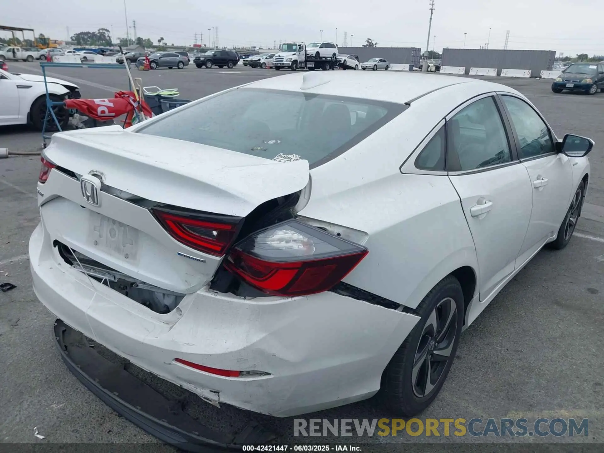 4 Photograph of a damaged car 19XZE4F55NE000688 HONDA INSIGHT 2022