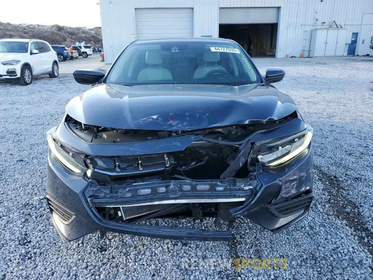 5 Photograph of a damaged car 19XZE4F56NE011358 HONDA INSIGHT 2022