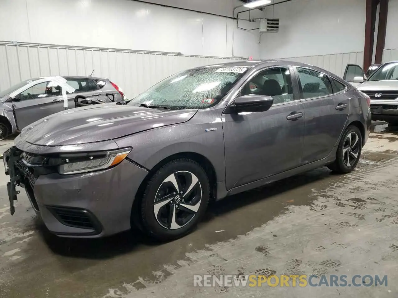 1 Photograph of a damaged car 19XZE4F57NE010137 HONDA INSIGHT 2022