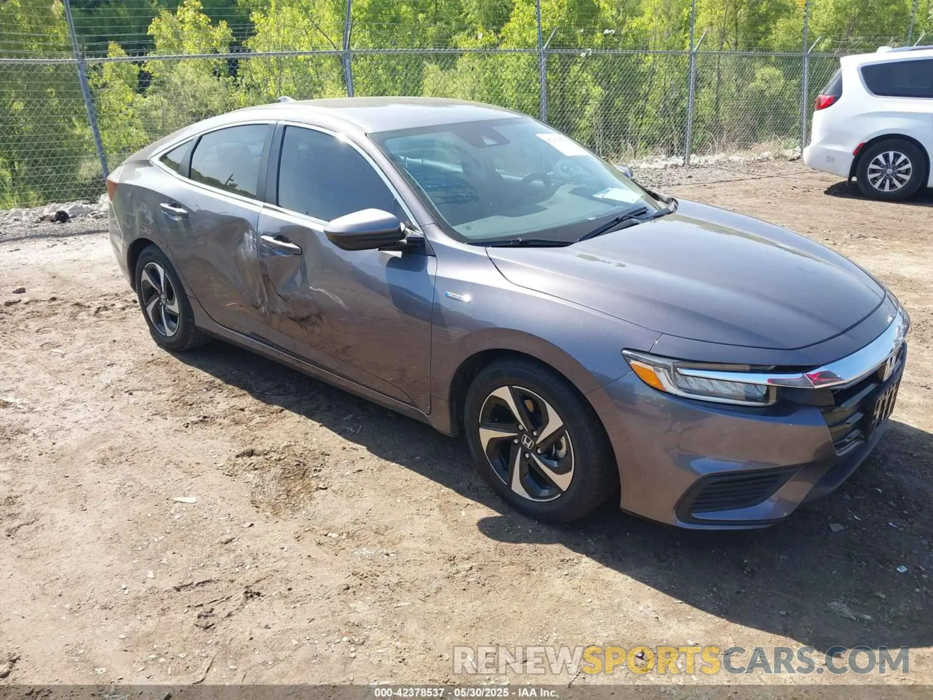 1 Photograph of a damaged car 19XZE4F57NE010882 HONDA INSIGHT 2022