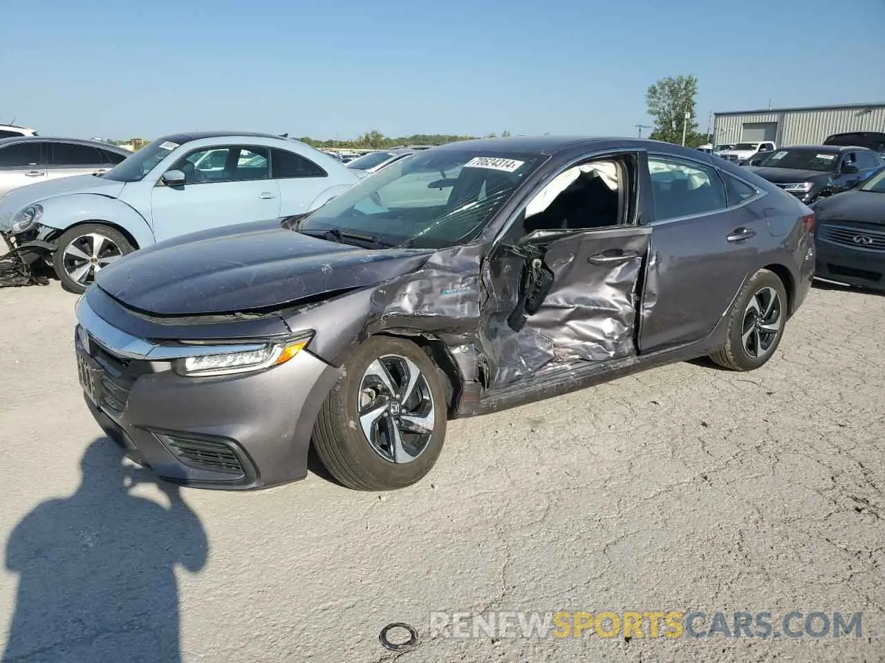 1 Photograph of a damaged car 19XZE4F58NE006386 HONDA INSIGHT 2022