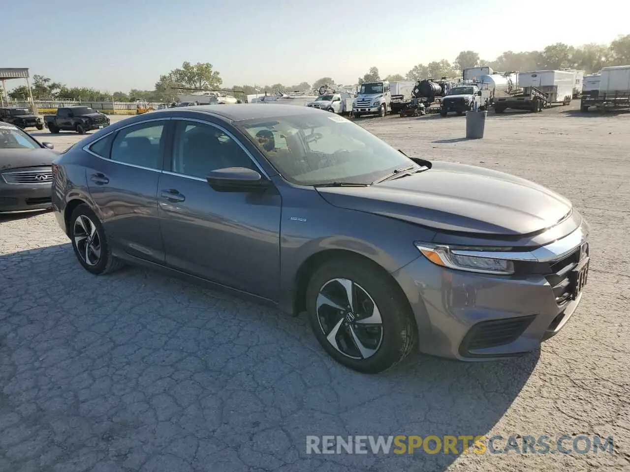 4 Photograph of a damaged car 19XZE4F58NE006386 HONDA INSIGHT 2022