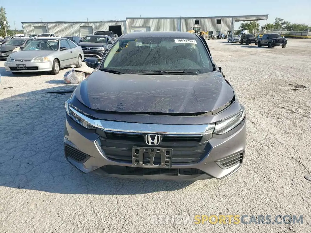 5 Photograph of a damaged car 19XZE4F58NE006386 HONDA INSIGHT 2022