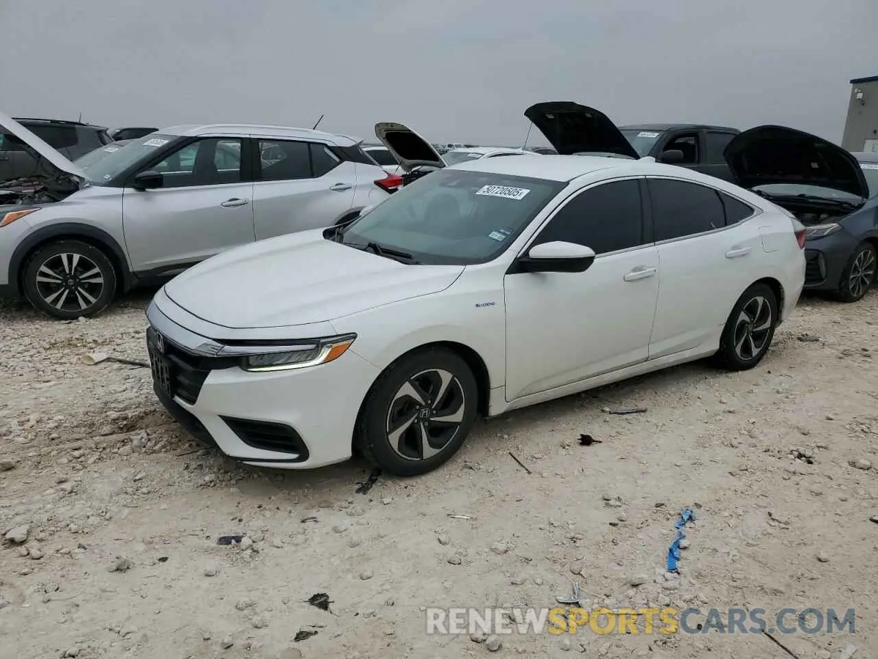 1 Photograph of a damaged car 19XZE4F59NE009443 HONDA INSIGHT 2022