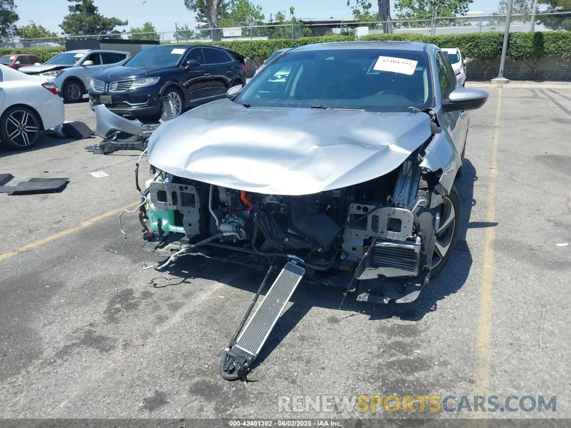 6 Photograph of a damaged car 19XZE4F5XNE015879 HONDA INSIGHT 2022