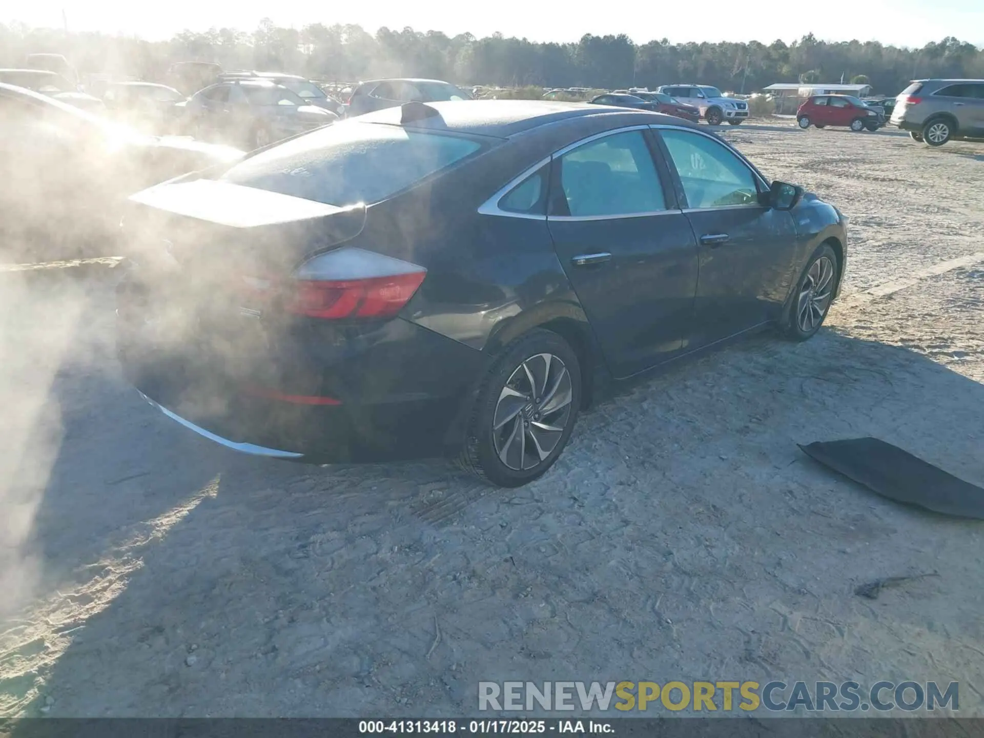 4 Photograph of a damaged car 19XZE4F90NE008894 HONDA INSIGHT 2022