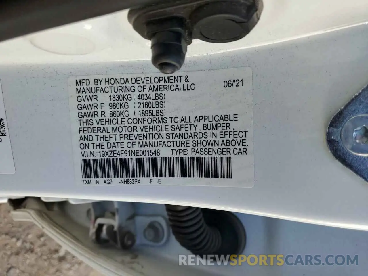 12 Photograph of a damaged car 19XZE4F91NE001548 HONDA INSIGHT 2022