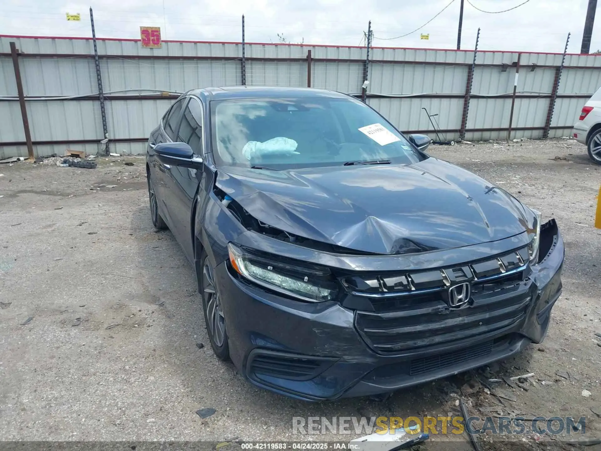 1 Photograph of a damaged car 19XZE4F92NE006127 HONDA INSIGHT 2022