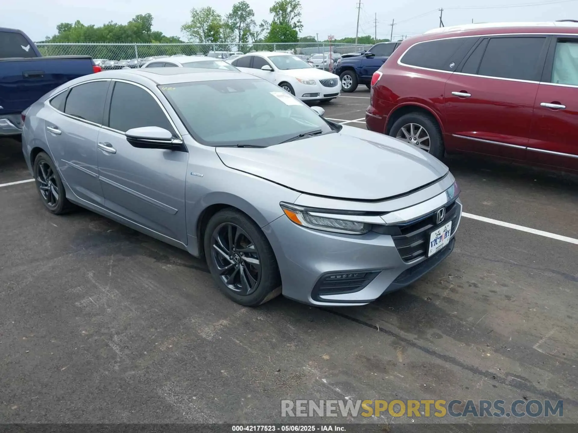 1 Photograph of a damaged car 19XZE4F94NE005917 HONDA INSIGHT 2022