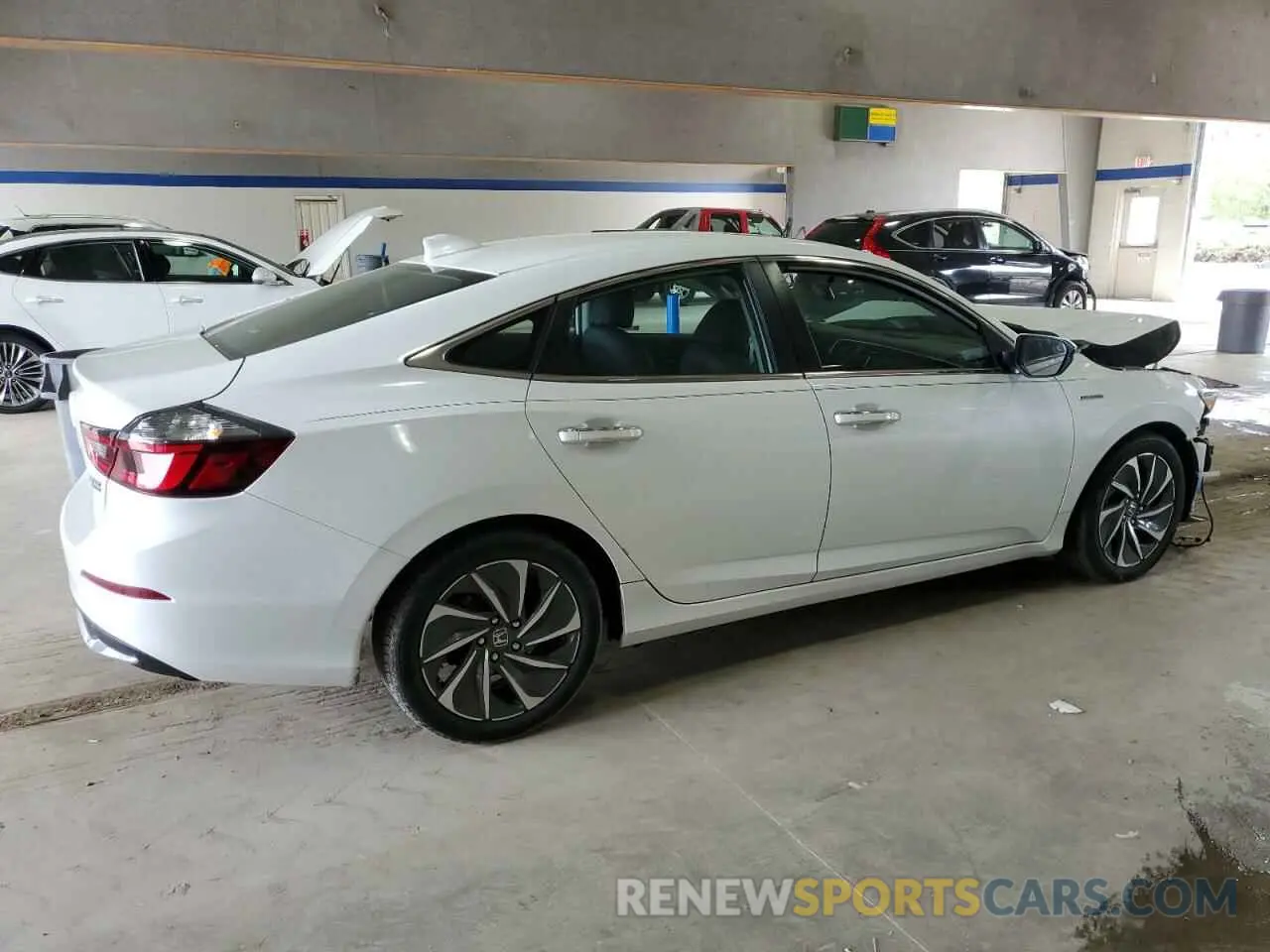 3 Photograph of a damaged car 19XZE4F94NE015248 HONDA INSIGHT 2022