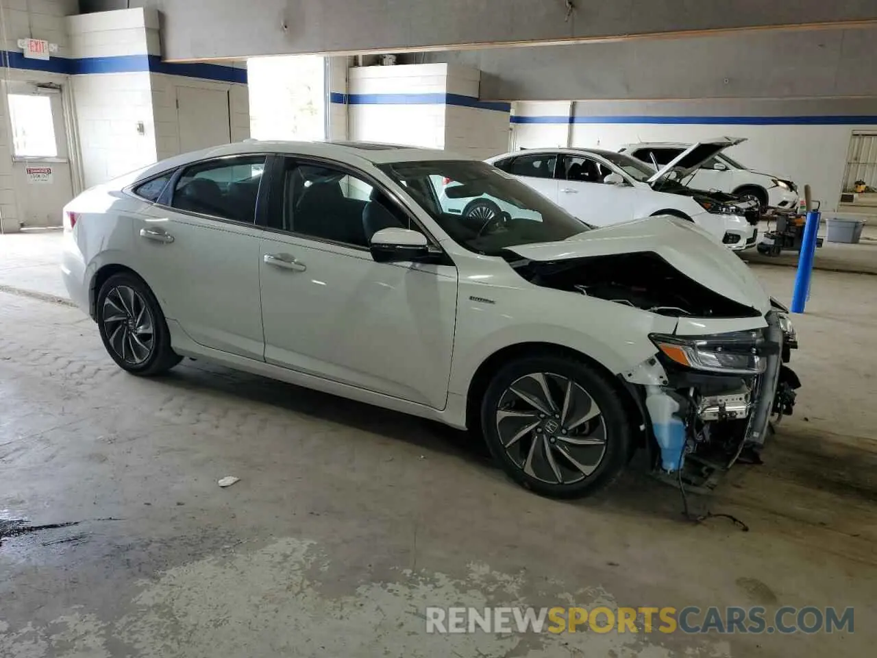 4 Photograph of a damaged car 19XZE4F94NE015248 HONDA INSIGHT 2022