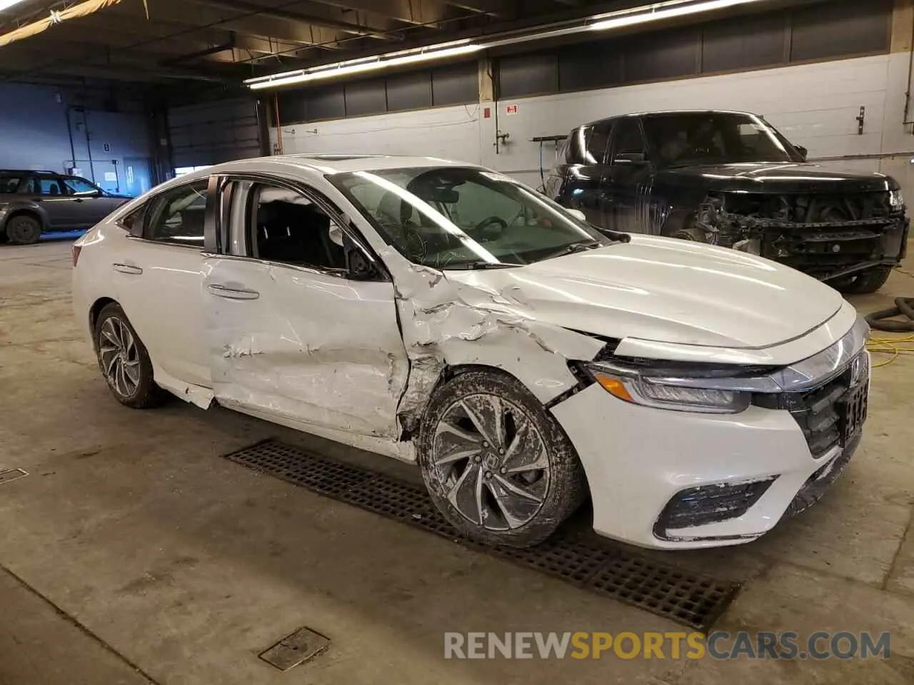 4 Photograph of a damaged car 19XZE4F97NE005510 HONDA INSIGHT 2022